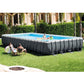 Intex 24ft x 12ft x 52in Ultra XTR Frame Rectangular Swimming Pool Set with Sand Filter Pump, Ladder, Ground Cloth, Cover and Robot Vacuum image 5
