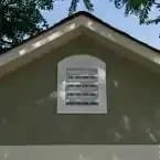 Installed Meridian 8 ft. x 10 ft. Wood Storage Shed with Autumn Brown Shingles image 3